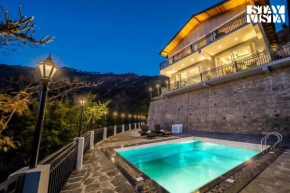 StayVista at Sunset Springs with Heated Pool & Views